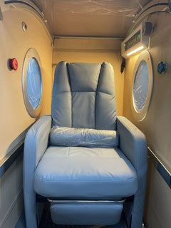 Hard Seated Hyperbaric Chamber 2.0 ATA inside view of reclining chair and both windows