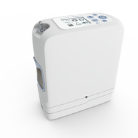 A small, lightweight device that provides oxygen for people with respiratory conditions. It has a carry handle and a control panel with buttons and a display screen.