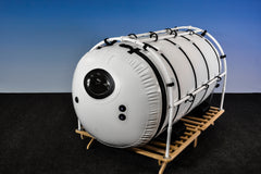 Summit To Sea Grand Dive Pro with platform. 46" diameter, 8' long, stretcher-compatible, 1.3 ATA. Portable hyperbaric chamber